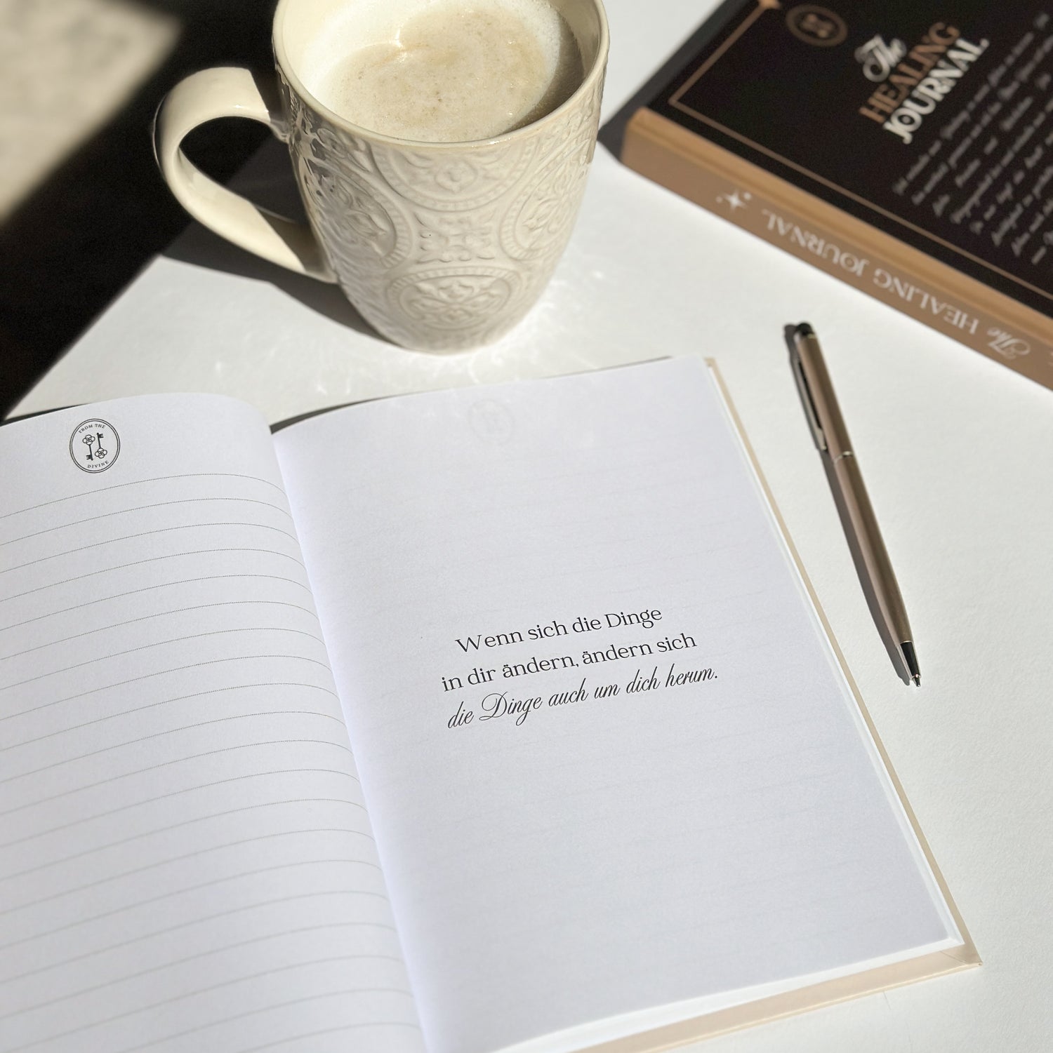 the healing journal schwarz beige offenes buch zitat from the divine